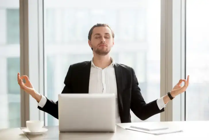 Person practicing mindful breathing